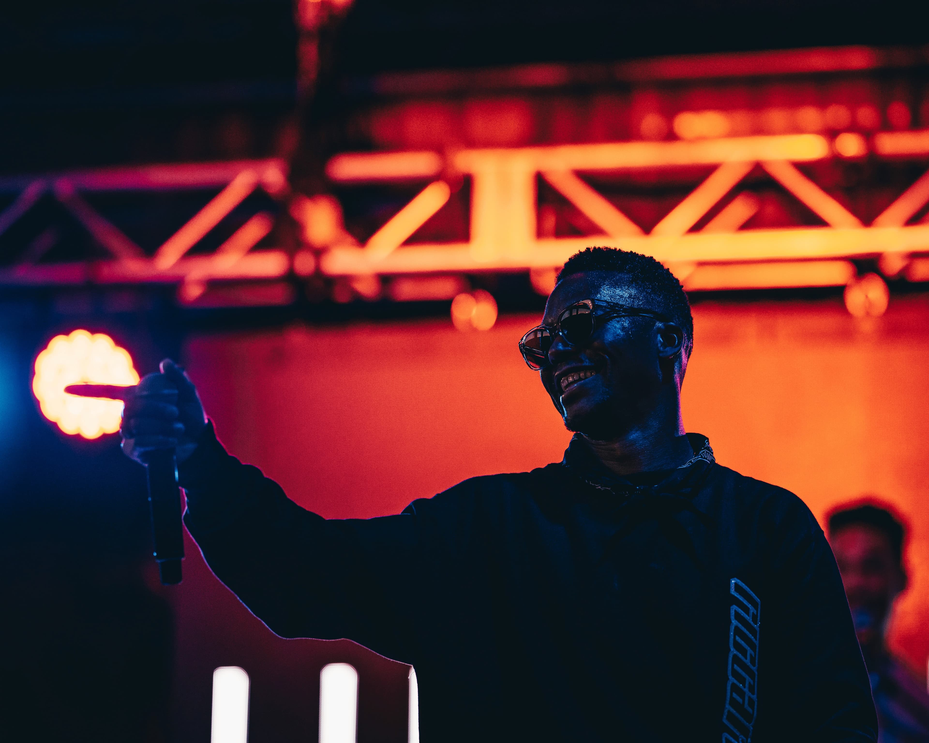 Live artist photography integrated into a premium campaign website